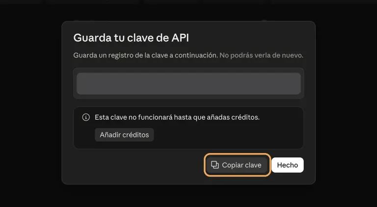 El diálogo «Guarda tu clave de API», con la clave tapada y el botón «Copiar clave» señalado